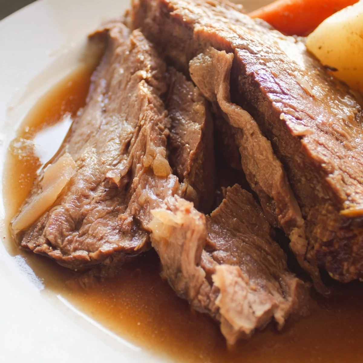 Golden Slow Cooker Beef Roast and root vegetables in a rustic slow cooker insert.
