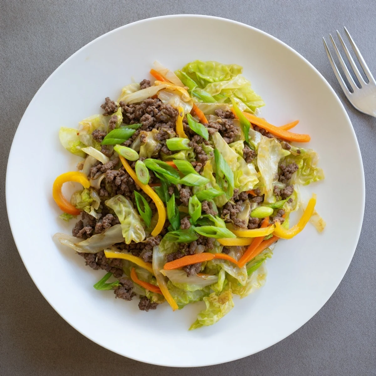 Hearty skillet meal featuring seasoned ground beef mixed with tender crisp cabbage vegetables