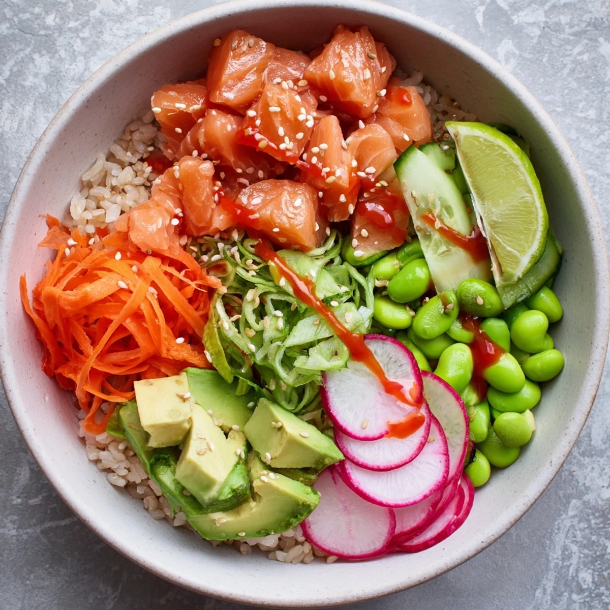 Fresh salmon and avocado poke bowl with colorful vegetables over seasoned sushi rice