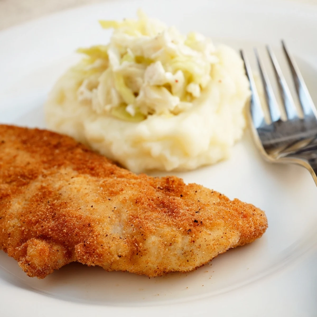 Buttermilk marinated Fried Chicken Breast, crunchy crust and juicy interior, fork tender  